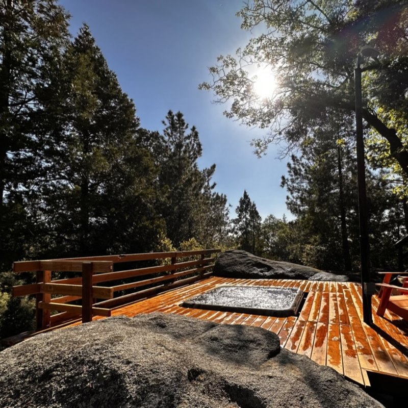 Hot tub on the deck among the pines